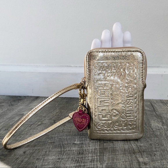 Coach Handbags - Coach Poppy Gold Small iPhone Wristlet Zip Pouch